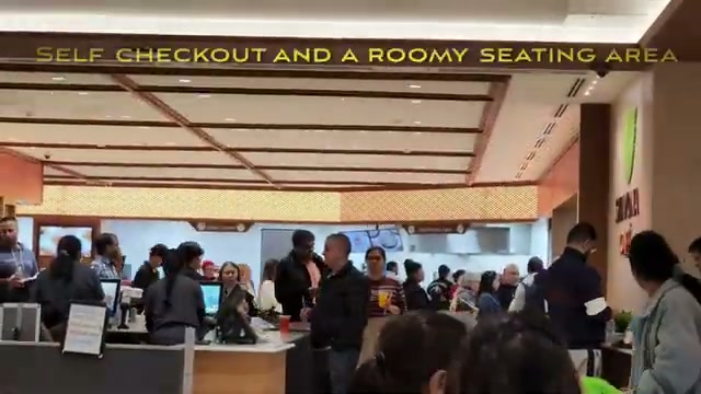 Self checkout and the roomy café seating area
