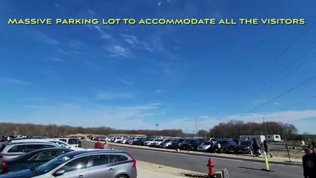 The massive visitor parking lot