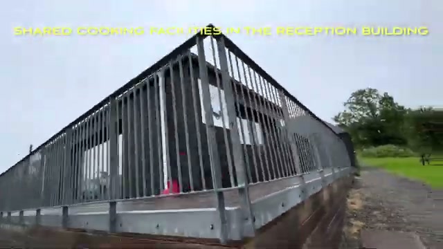 The enclosed deck leading to the reception building with its shared cooking facilities