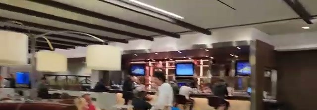 The Delta Sky Club lounge at JFK is large, with a full bar and buffet