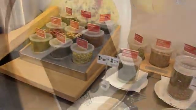 Breakfast spread with yogurts and toppings
