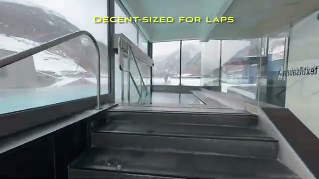 Steps down into the heated outdoor pool
