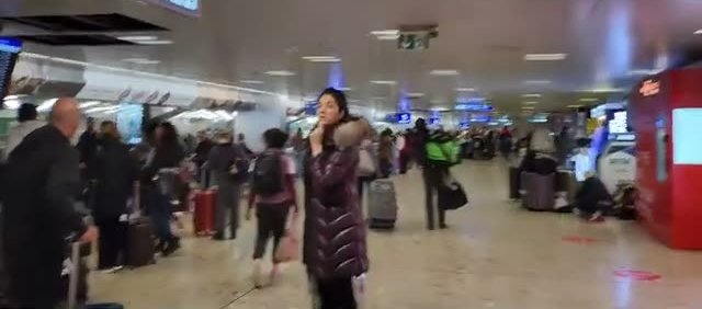 The busy Swiss-side baggage hall