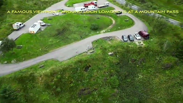 Drone view of the busy mountain-pass car park on the Loch Lomond side