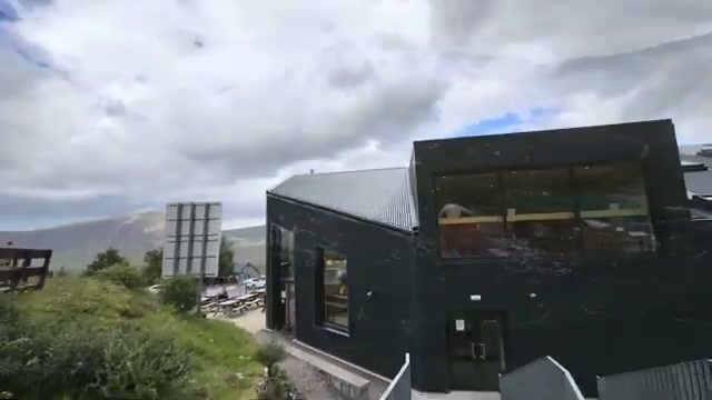 The black panoramic restaurant building