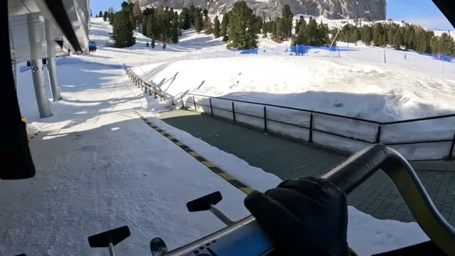 Riding out of the station, mountains ahead