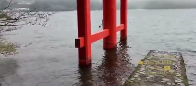 Hakone Shrine’s torii gate standing in Lake Ashi