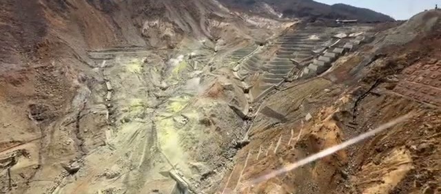 The volcanic valley of Owakudani seen from the descending ropeway