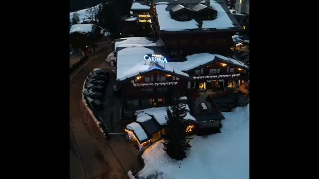 Hotel Carlina at dusk in Courchevel 1850