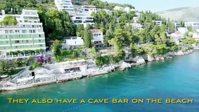 The rocky beach and cave bar on the bay