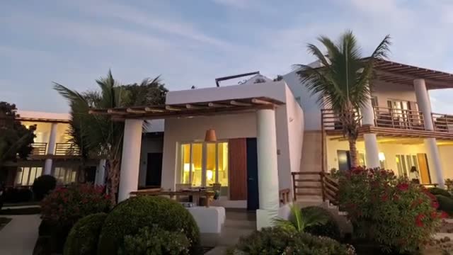 One of the hotel villas at dusk
