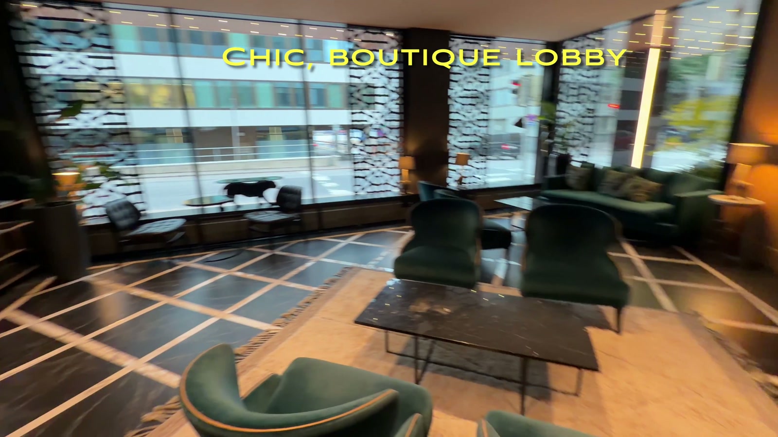 Hotel U14’s chic, boutique lobby with green velvet armchairs