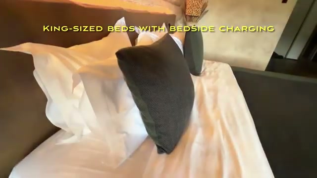 King-sized bed with bedside charging