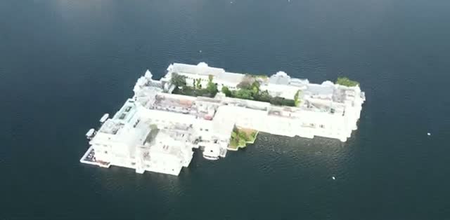 Aerial view of the Taj Lake Palace’s courtyards and white-walled wings