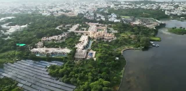 The Oberoi Udai Vilas resort and its grounds on the lakeshore