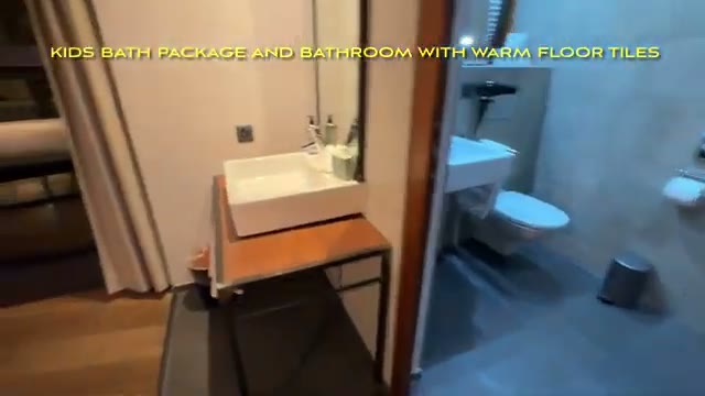 Bathroom with vessel sink and separate WC area