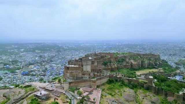 Aerial view of Mehrangarh Fort rising above Jodhpurβs blue houses