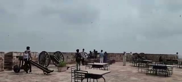 Cannons and visitors on the rooftop terrace