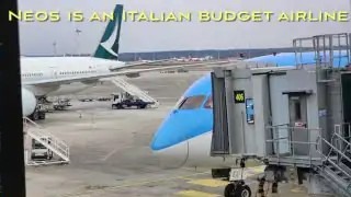 Neos Air Boeing 787 at the jet bridge at Milan Malpensa