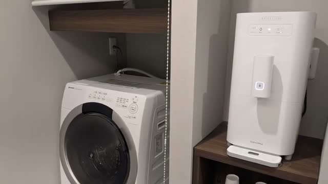 The laundry room with a combo washer/dryer