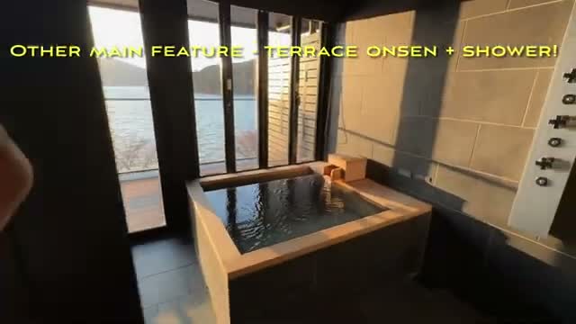 The private terrace onsen with its lake view