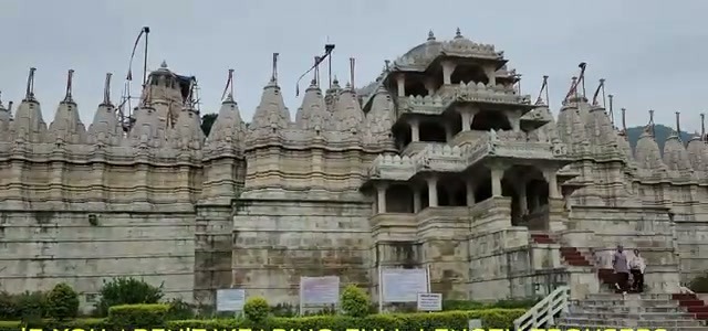 The white-marble exterior with its rows of shikharas