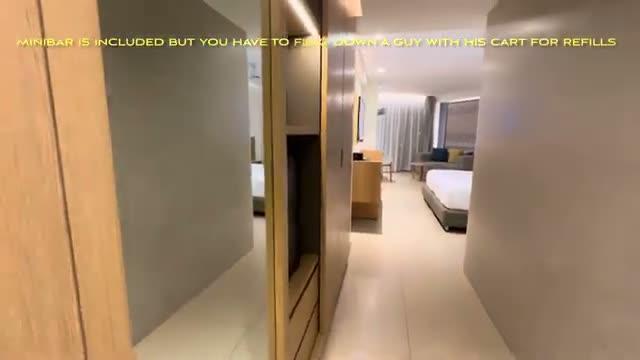 The room — minibar included, but refills require flagging down the cart
