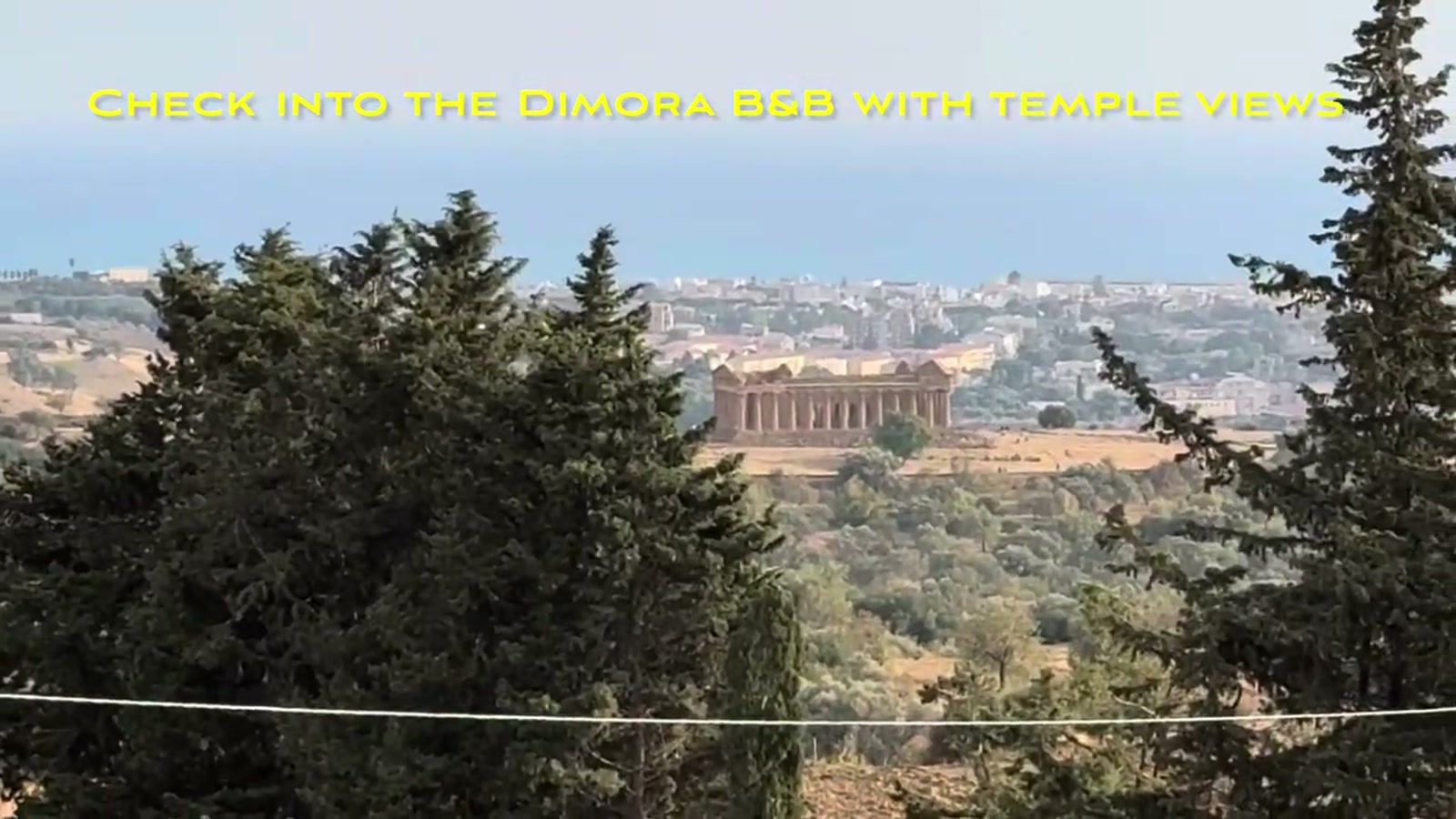 The Dimora B&B, with a Greek temple visible through the trees