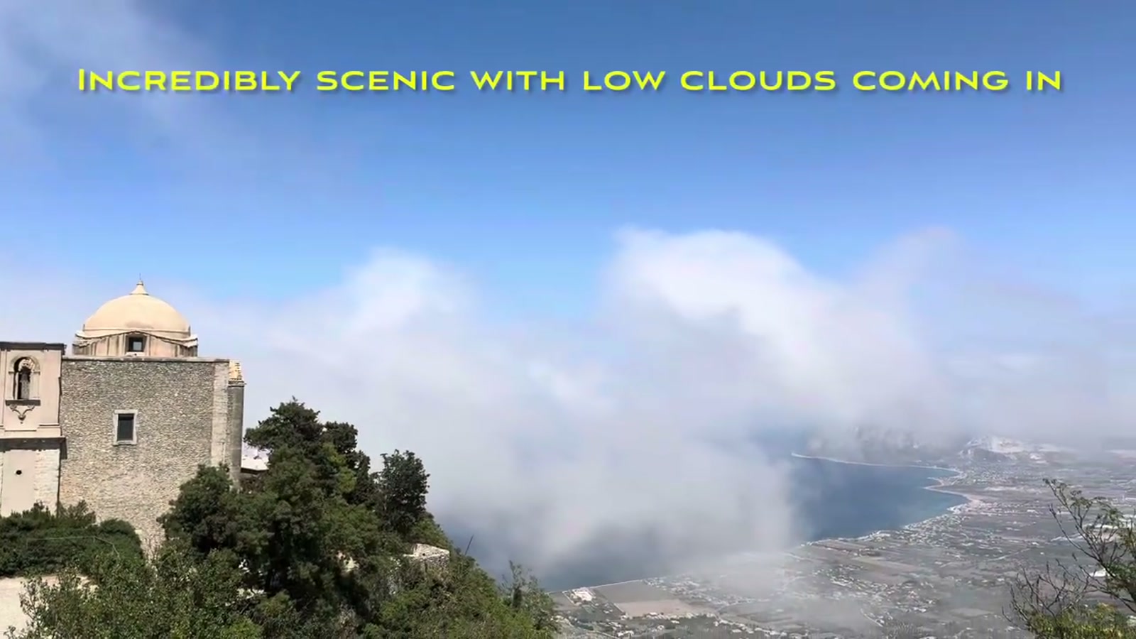 Low clouds rolling into the valley below Erice