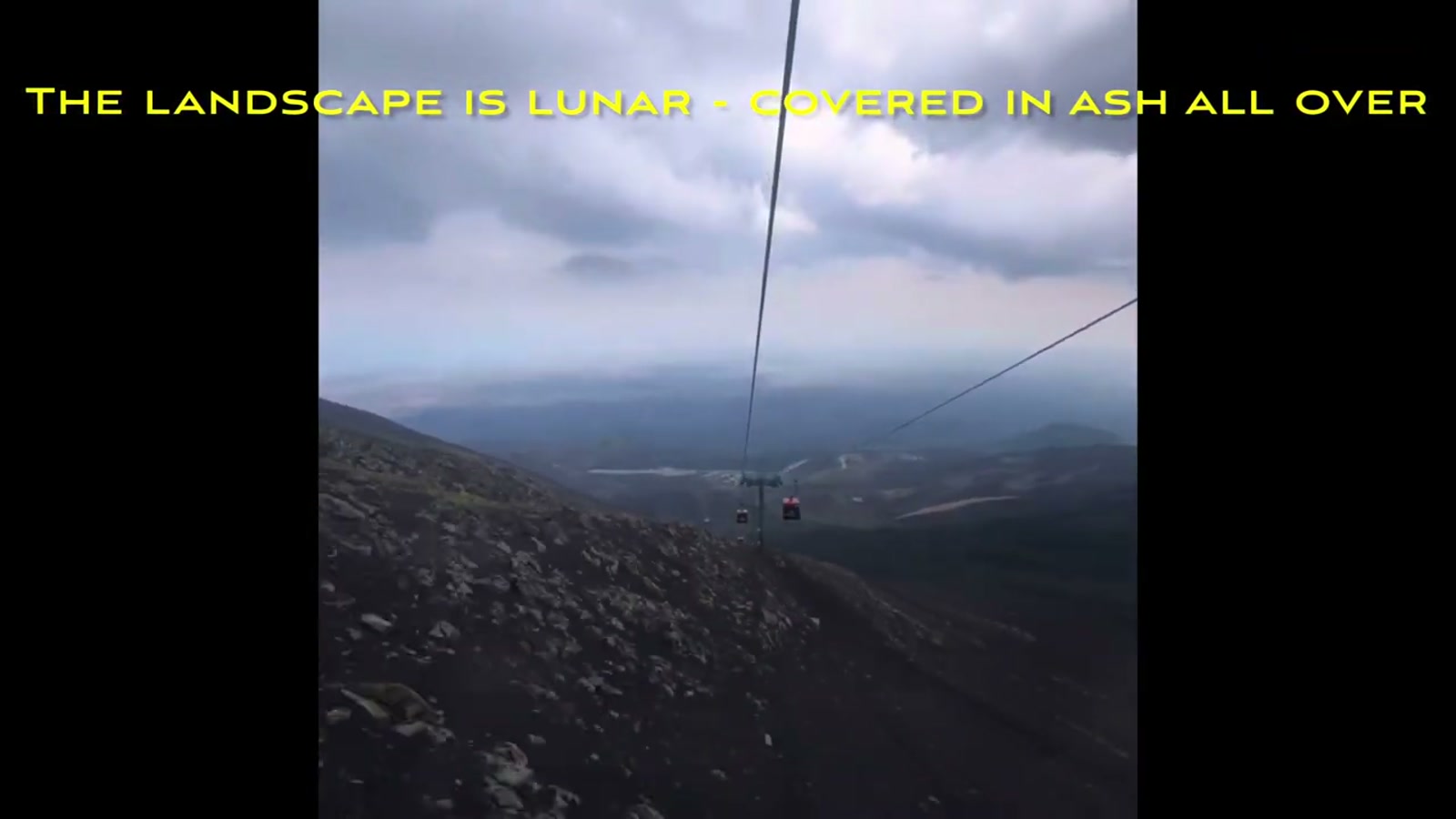 The Etna cable car climbing through the ash-covered landscape