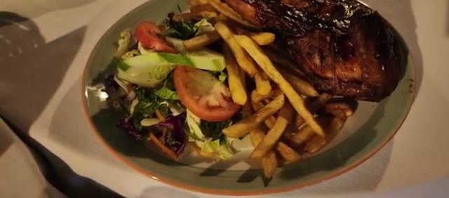 Piri-piri chicken with fries, dry and overcooked