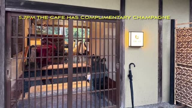 The cafe entrance — complimentary champagne from 5–7 PM