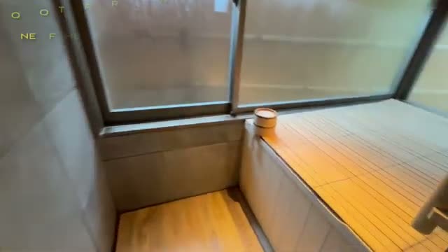 The in-room partially-open hot spring bath