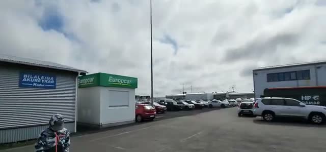 Returning the Model Y to the Europcar lot — short walk/shuttle back to the terminal