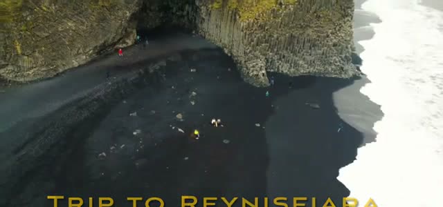 Reynisfjara black sand beach with basalt columns, seen from the drone