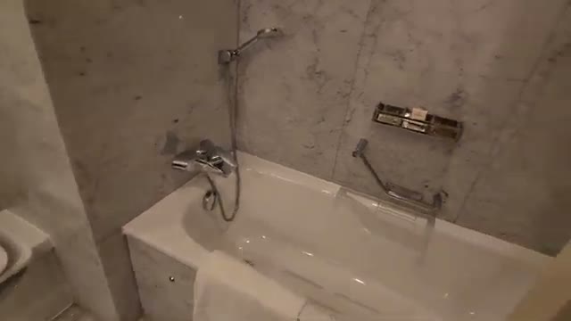 Marble-finish bathtub