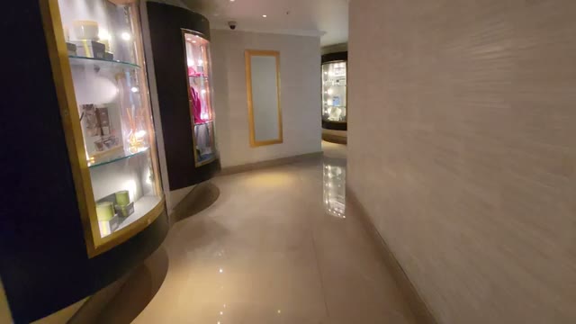 Retail display cabinets along the hallway